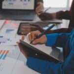 cfo recruiters controller recruiters - finance director analyzing revenue and cash flow for Michigan Indiana Ohio business owners