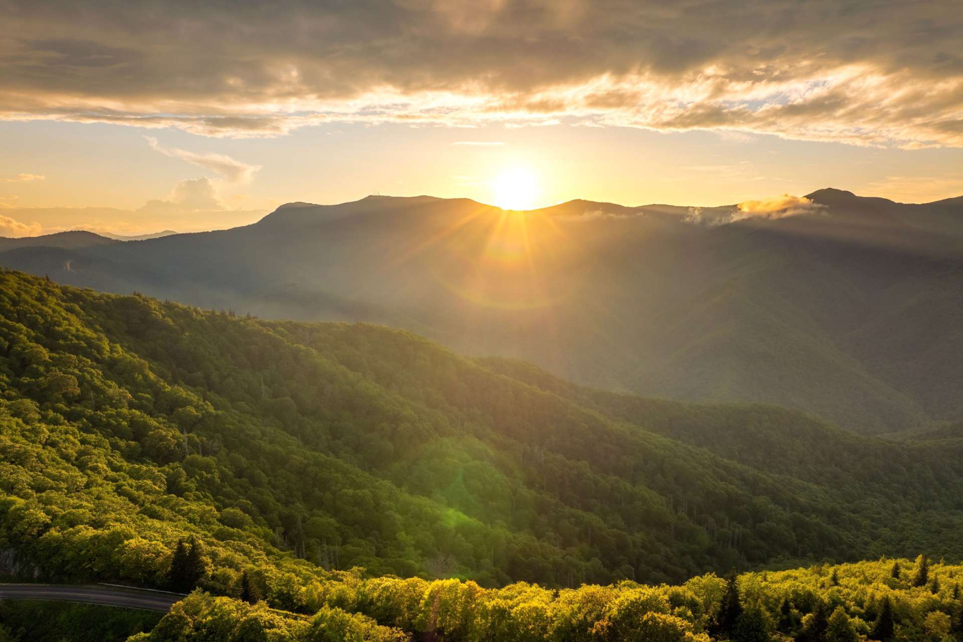 Sunset over Appalachian mountain ridges representing the importance of executive leadership in business
